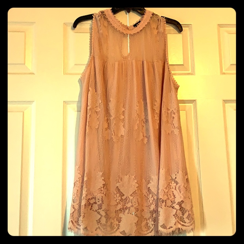 Pink sleeveless blouse